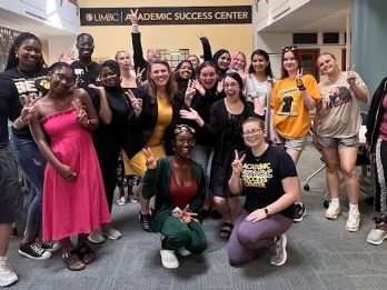 Group picture of below the Academic Success Center sign